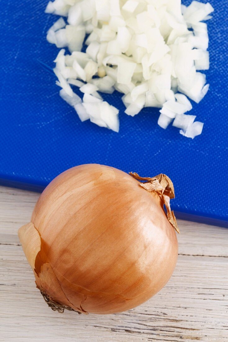 A whole onion and chopped onions