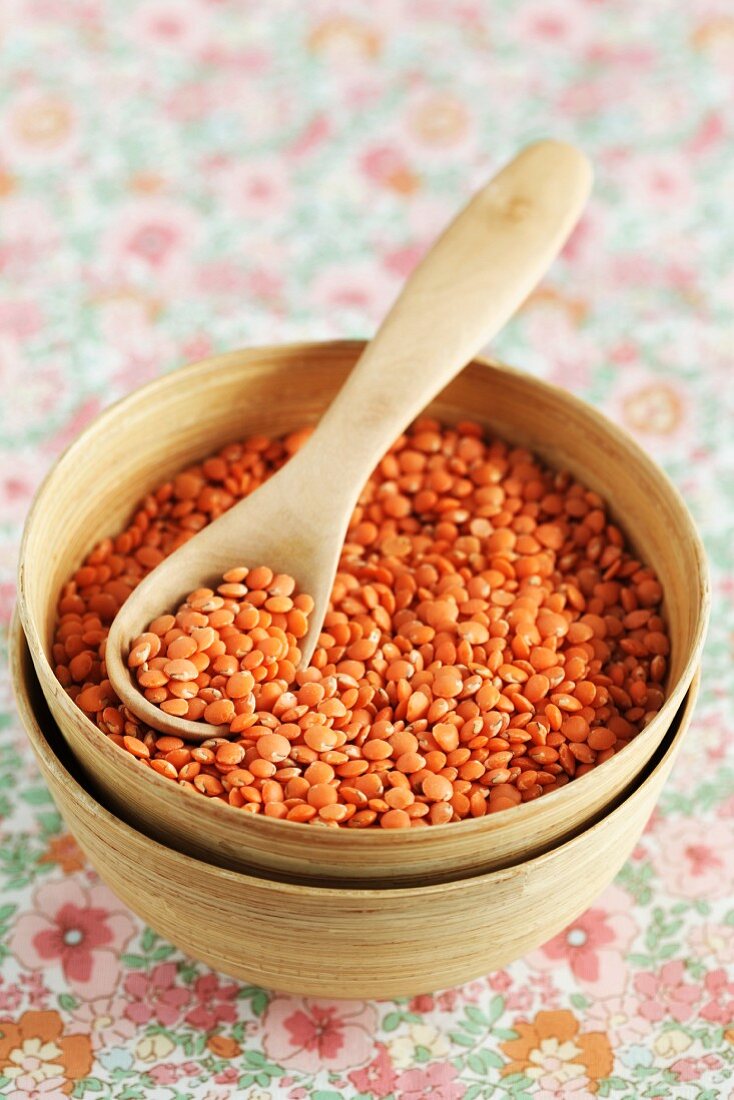 Red lentils in a wooden bowl
