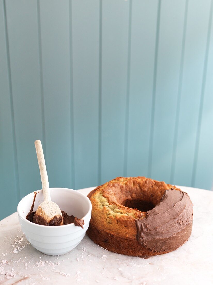 A banana cake with chocolate topping