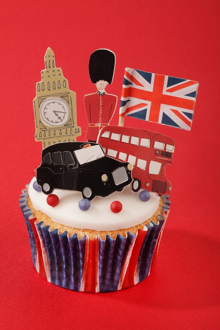 A cupcake decorated with London icons