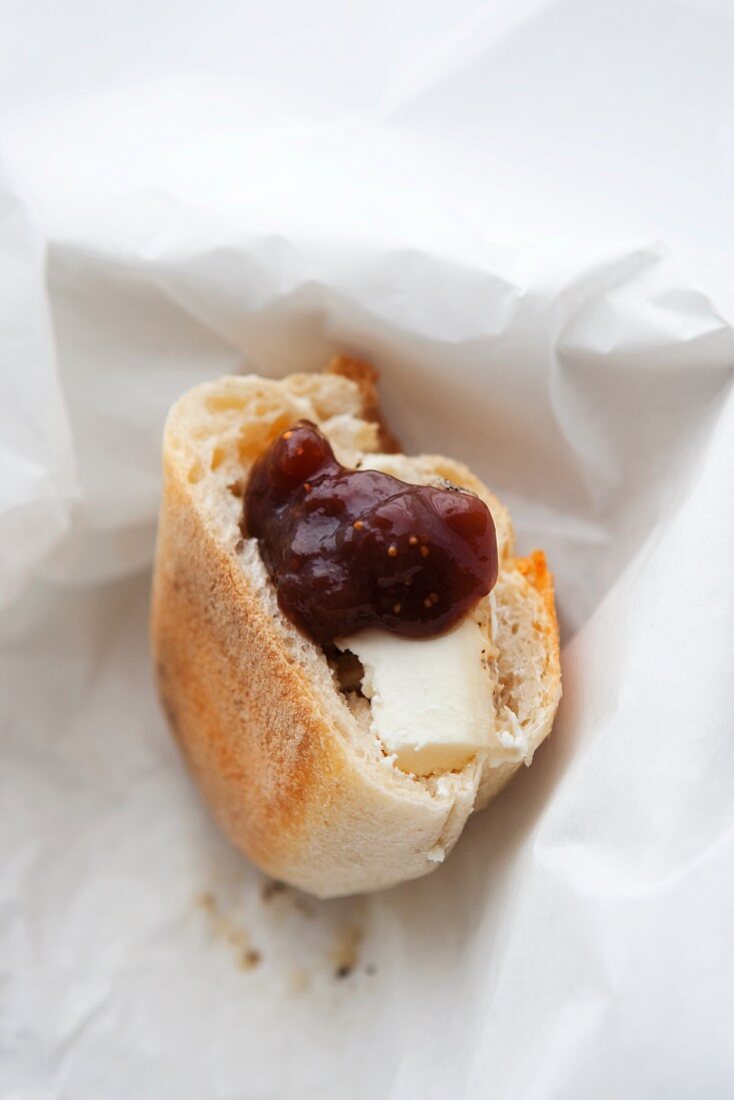 Piece of Baguette with Goat Cheese and Fig Preserve