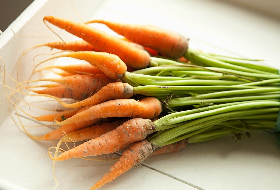 A Bunch of Organic Baby Carrots with Stems