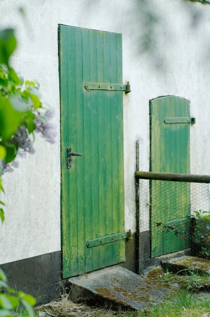 Building with two different wooden doors