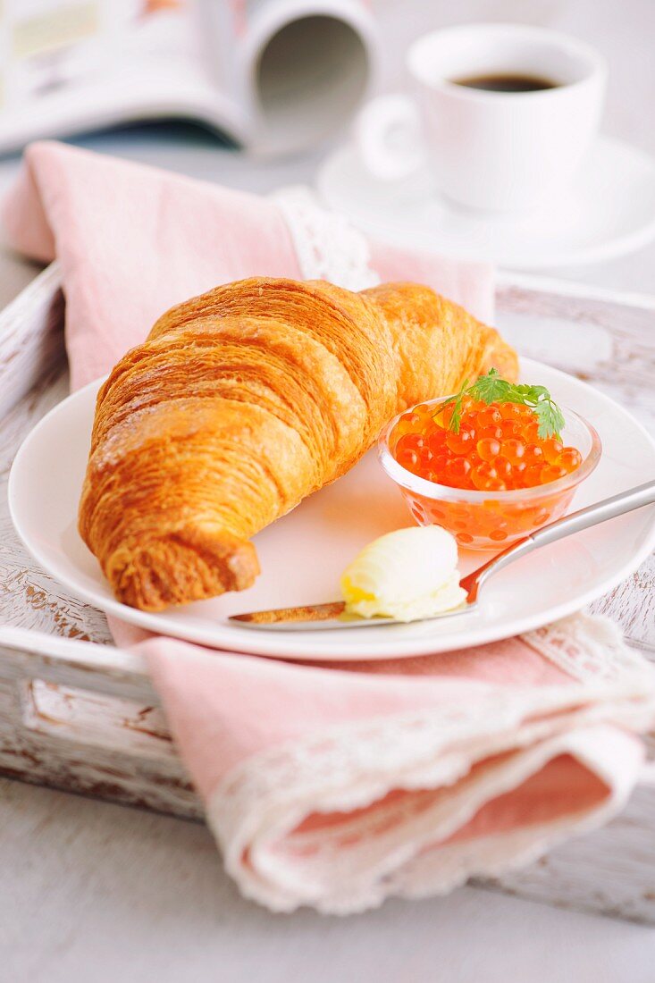 A croissant and caviar for breakfast