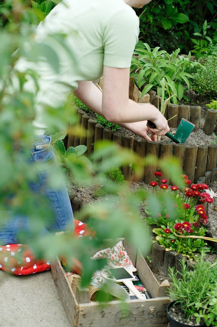 Woman outdoors gardening