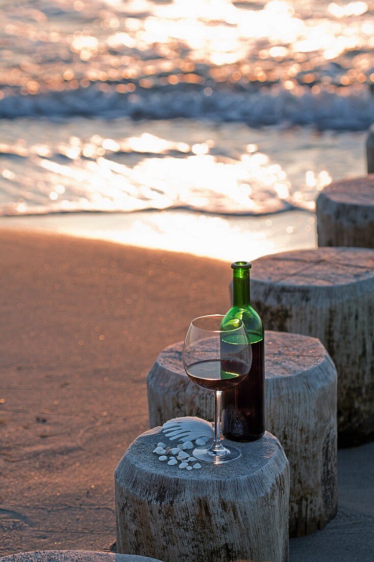 Enjoying a glass of wine at the beach