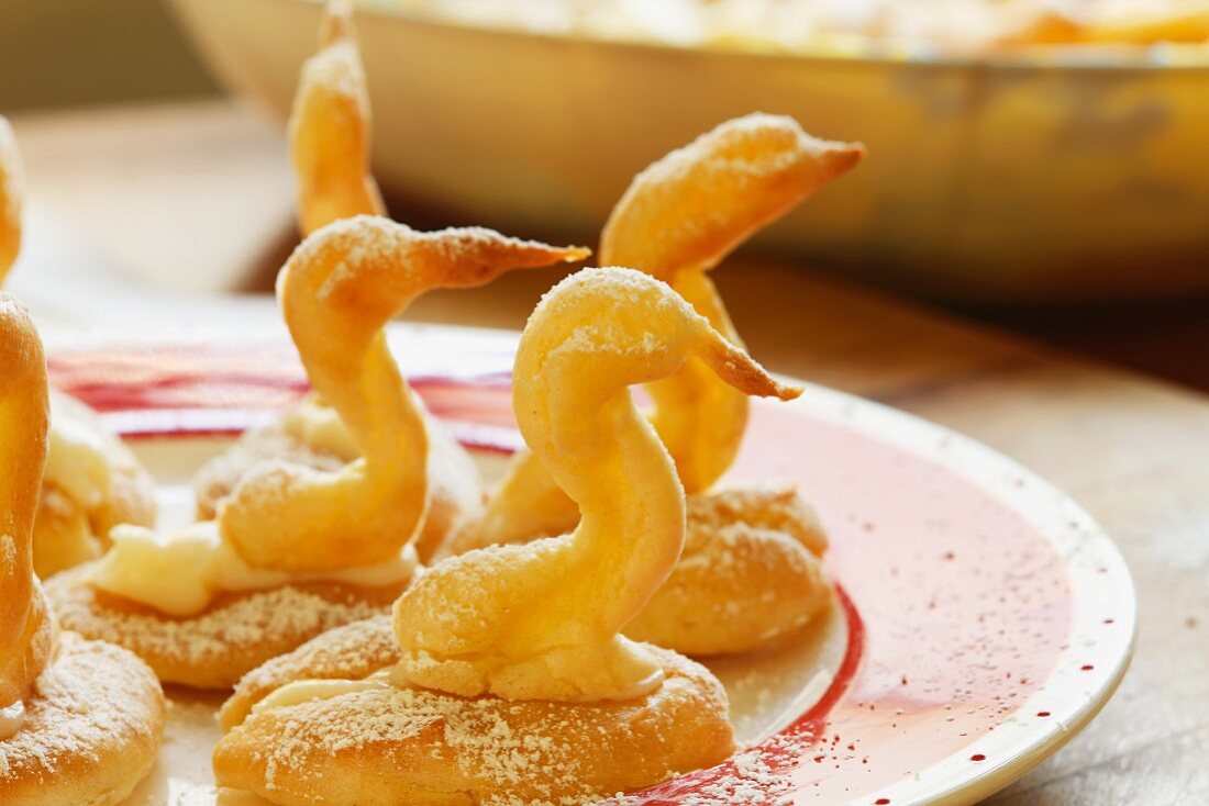 Choux Pastry Swans with Confectioners Sugar