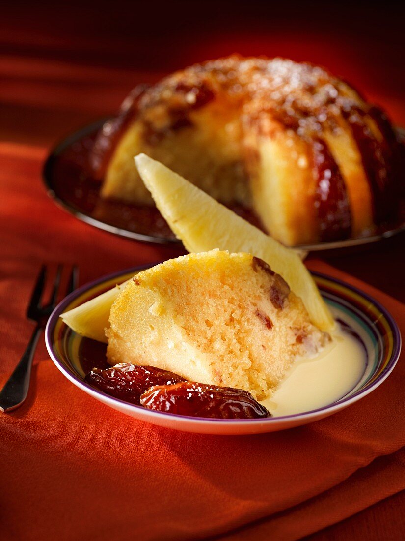 Date pudding with pineapple and vanilla sauce