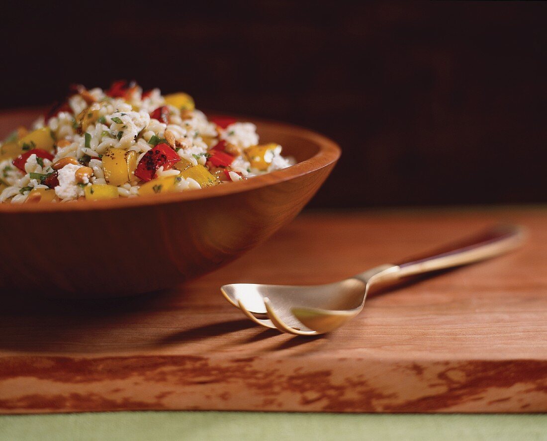 Bowl of Orzo Salad with Bell Peppers, Feta Cheese and Mint