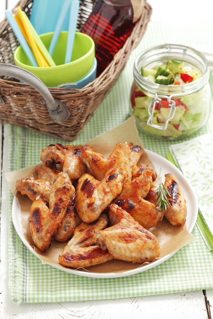 Roast chicken wings with vegetables salad