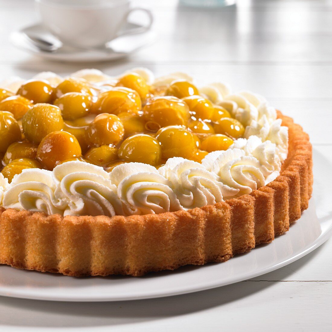 Mirabelle tart with whipped cream