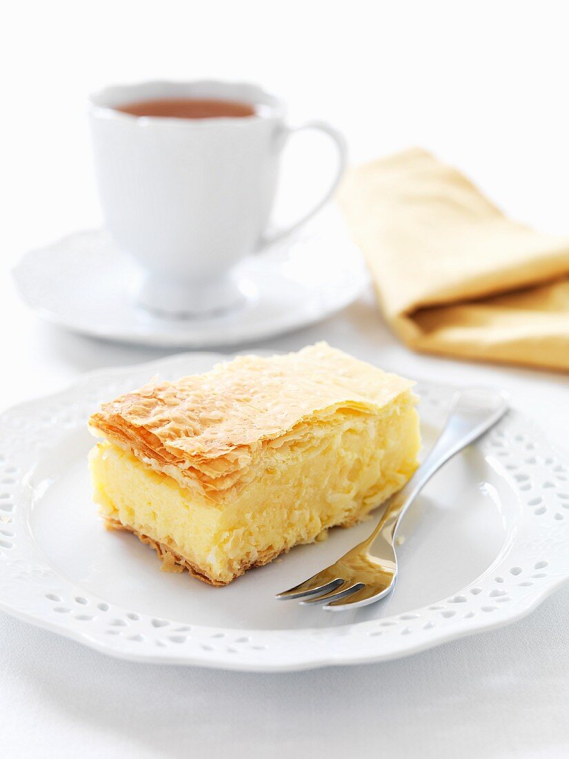 A lemon slice and a cup of tea