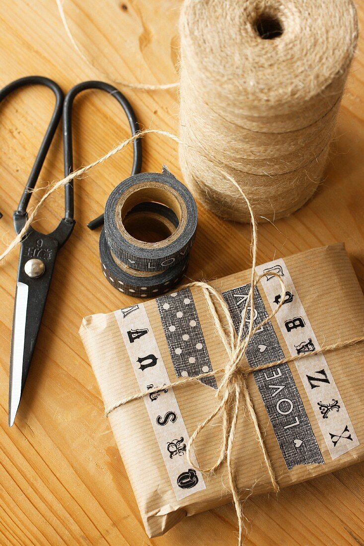 Package wrapped with lettered tape