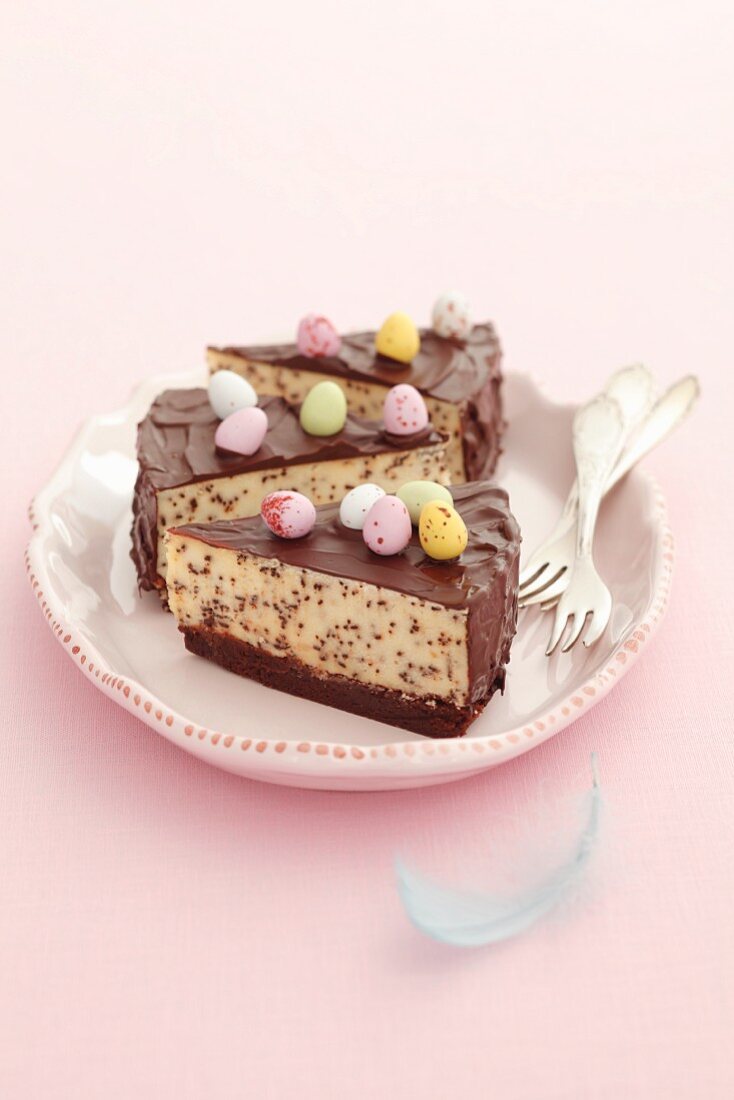 Three slices of cheesecake, chocolate chips and sugar eggs
