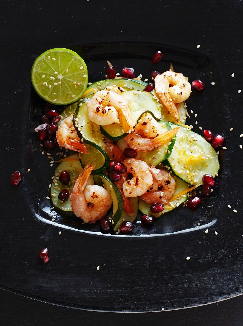 Courgettes with prawns and pomegranate seeds