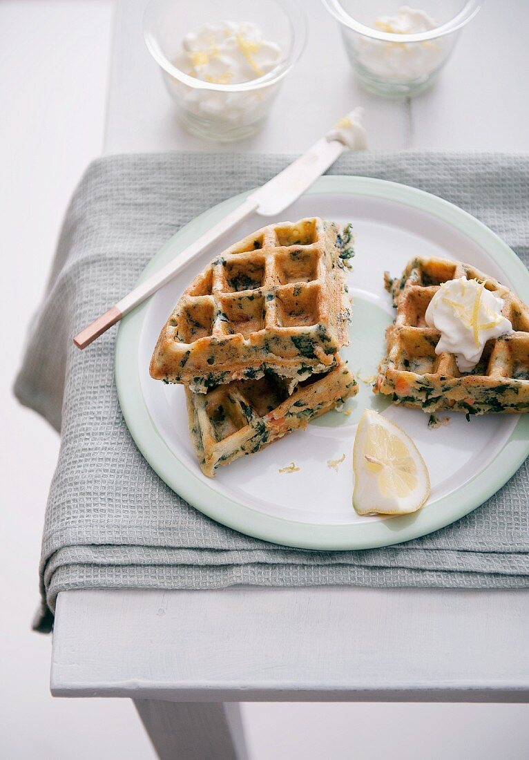 Waffles with salmon and spinach