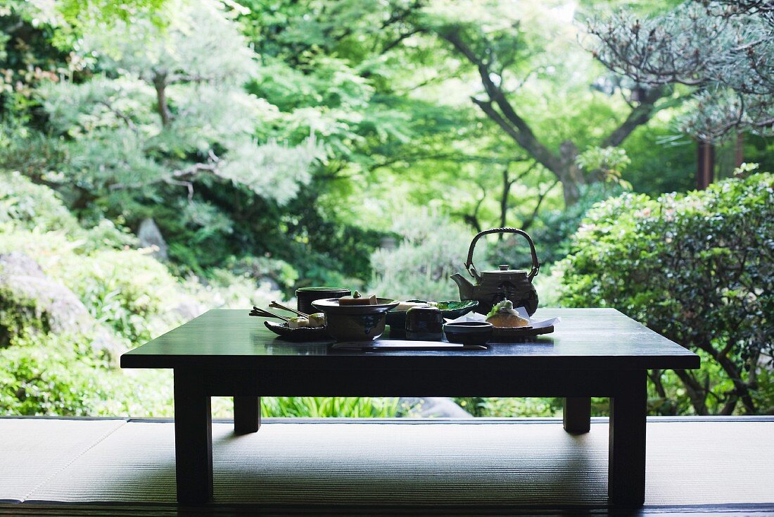 Traditional Japanese meal on table outdoors