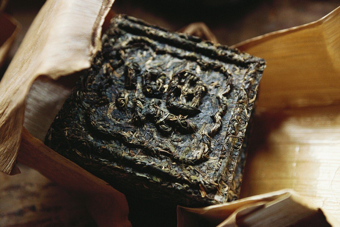Tea brick wrapped with dried bamboo leaf