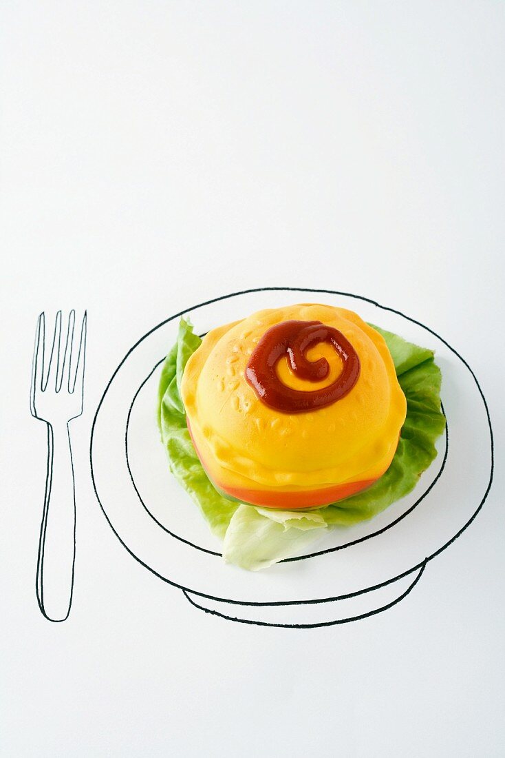 Plastic hamburger with lettuce and ketchup on drawing of plate