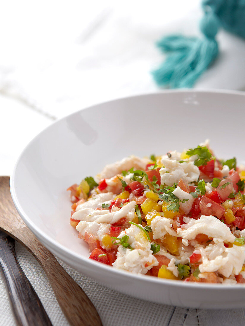 Hake ceviche with tomatoes and peppers