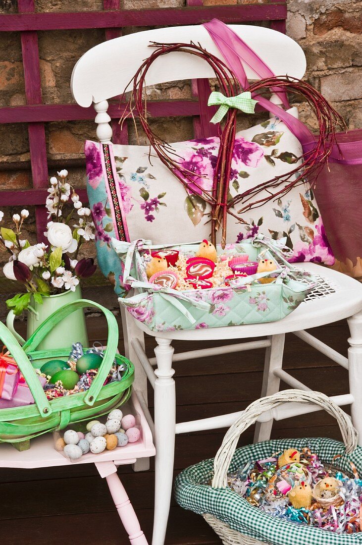 Vintage-style chair with cushions and Easter decorations