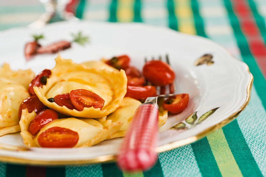 Ricotta ravioli with fried tomatoes