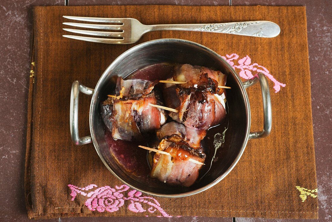 Figs wrapped in bacon with goats cheese and garam masala