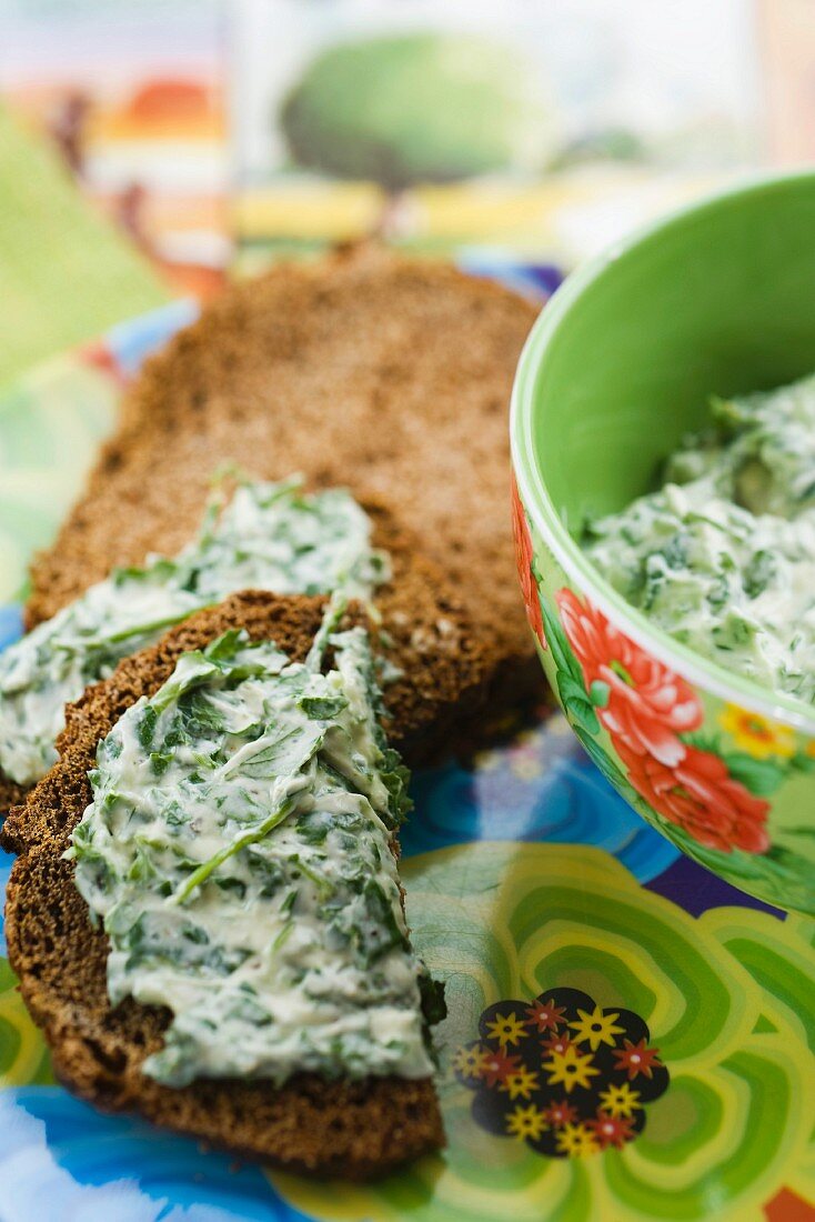 Spiced toast topped with a goat's cheese and herb spread