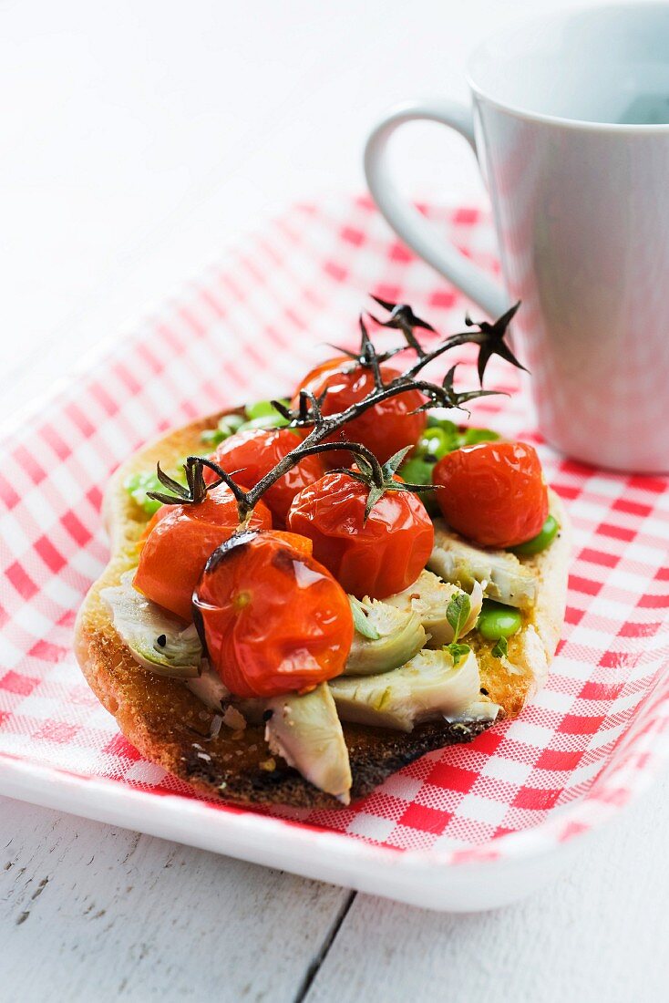 Toast topped with spring vegetables