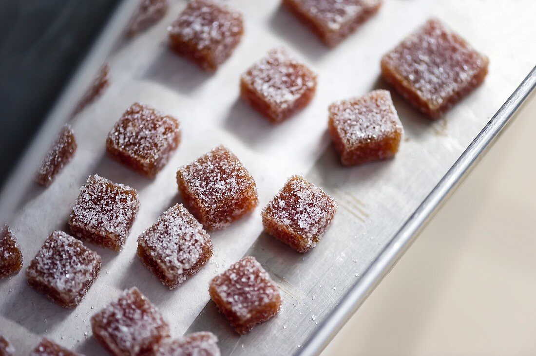 Quince sweets on a baking sheet