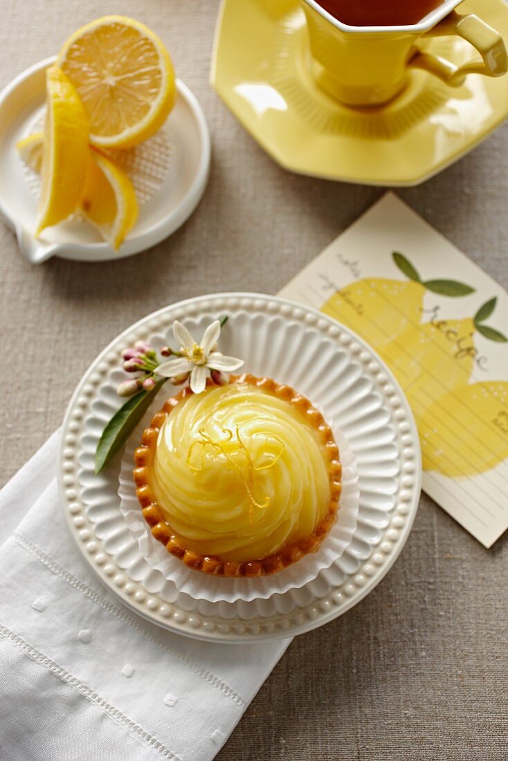 Individual Lemon Pie; From Above; Cup of Tea; Lemon Slices