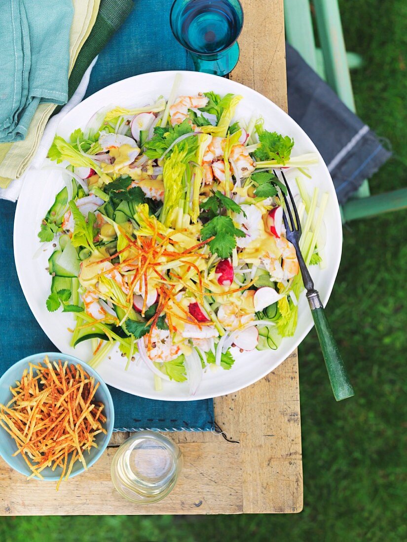 Celery salad with radishes and prawns