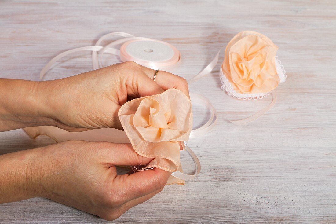 Tying silk flowers