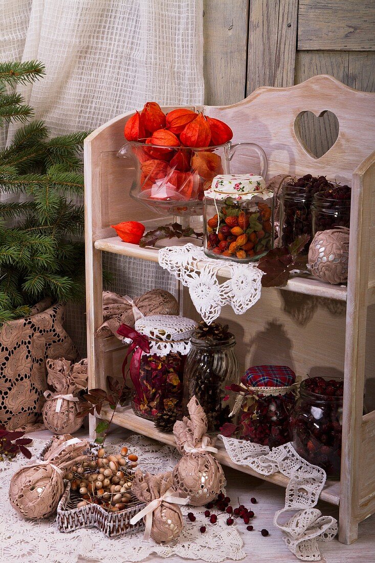Storage jars and Christmas decorations on a small shelf