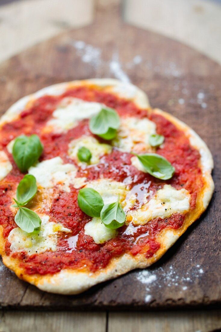 Pizza margerita with mozzarella and basil