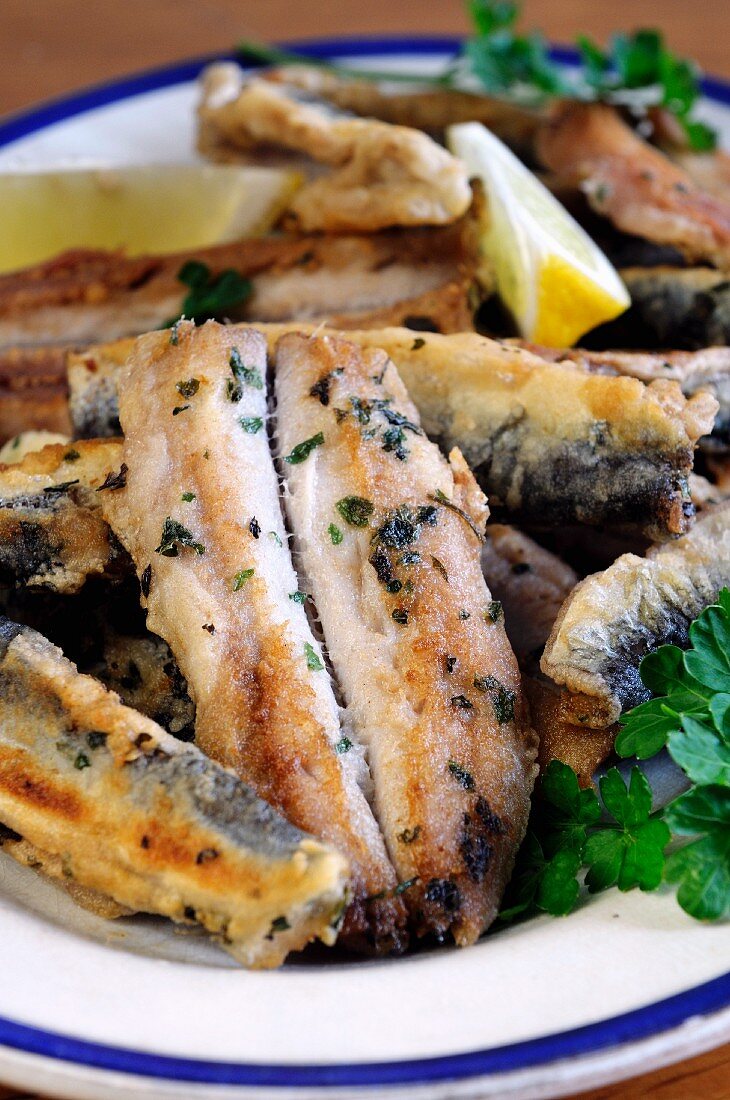 Pan-fried herring fillets with parsley