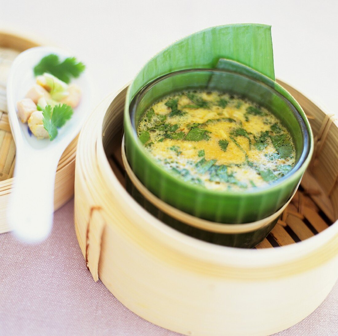 Chicken flan being prepared in a bamboo steamer (Korea)