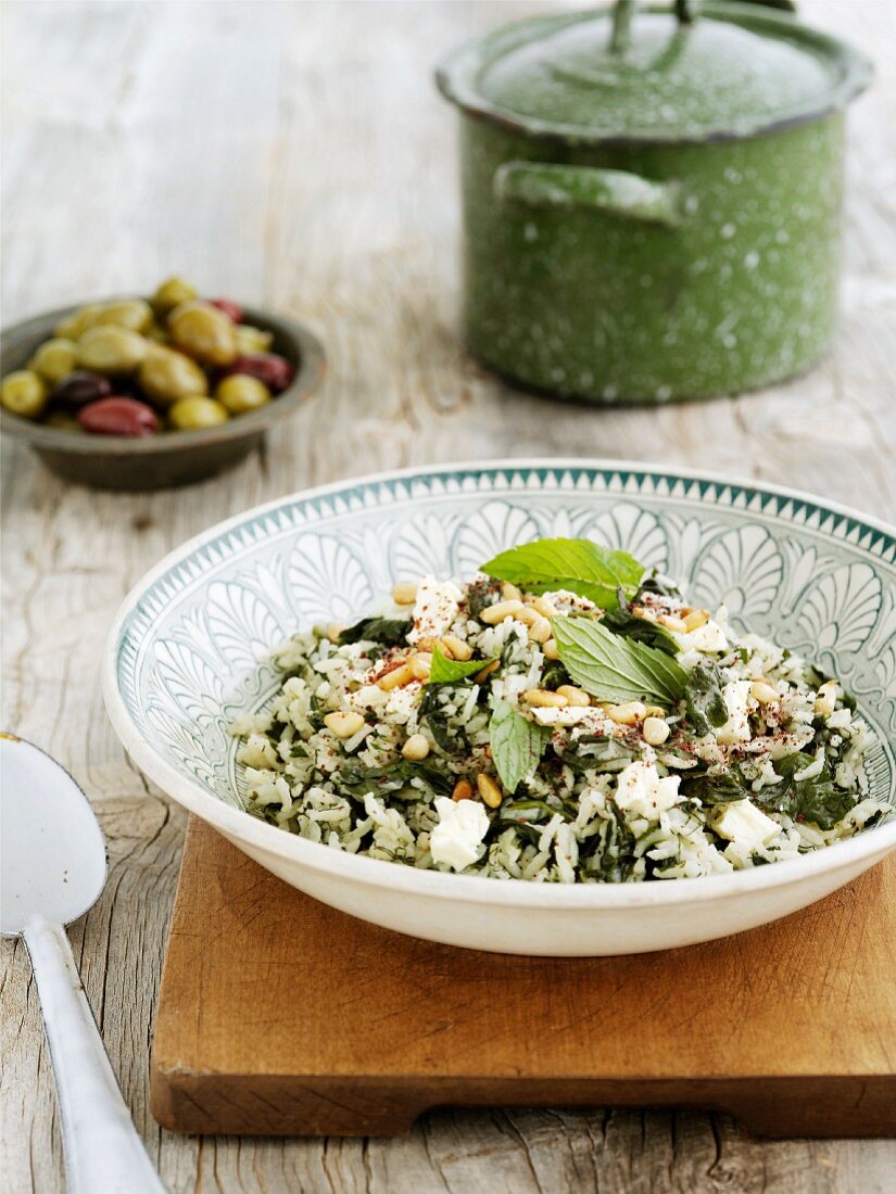 Rice salad with spinach, feta cheese and mint