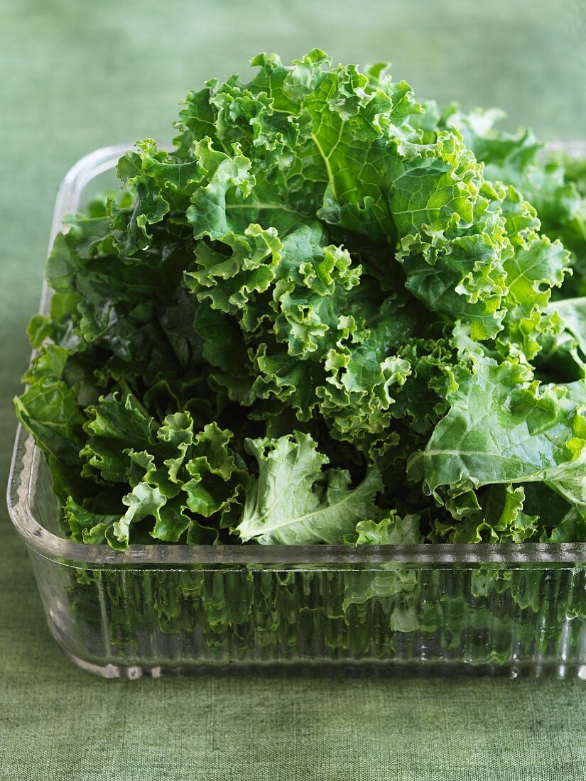 Raw Kale in a Plastic Container