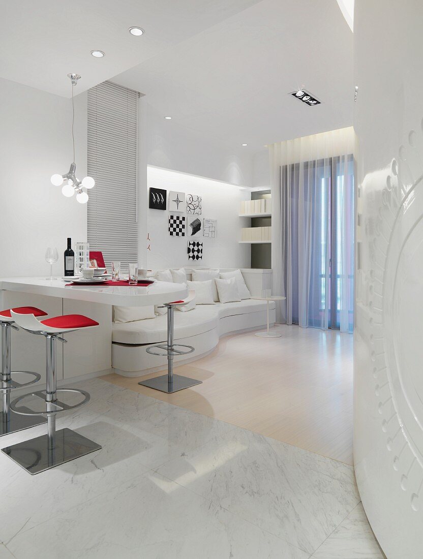 White modern living and dining area