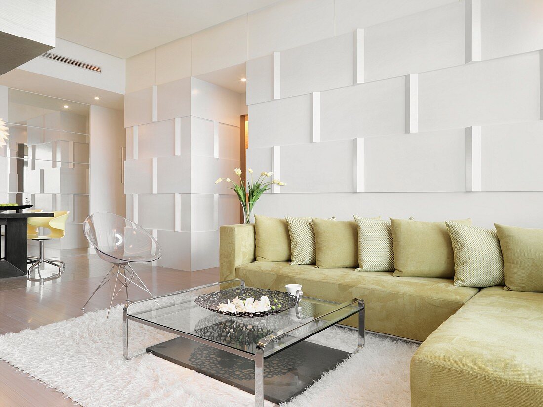 Elegant designer interior with corner sofa against wall with 3D structured surface
