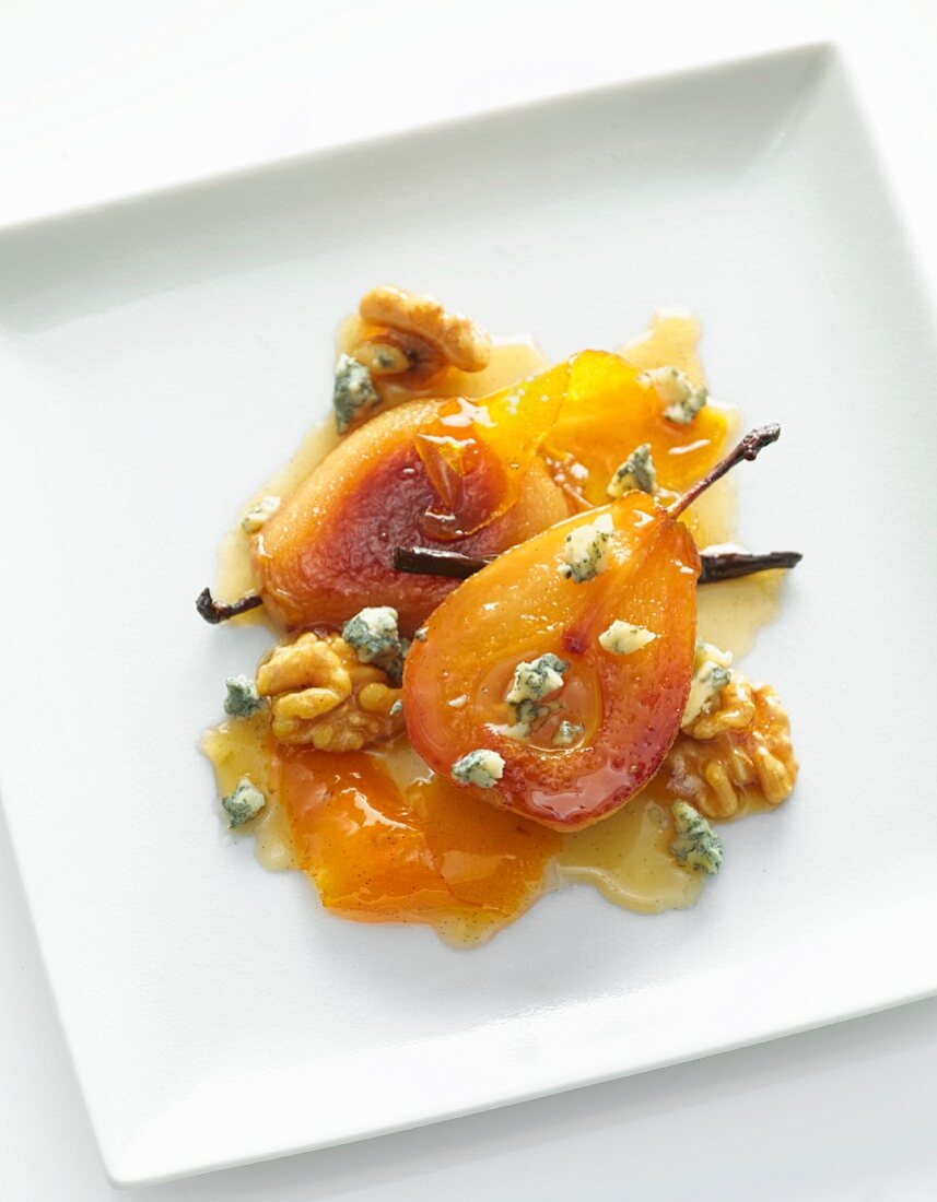 Poached Pears with Honey, Candied Walnuts and Blue Cheese