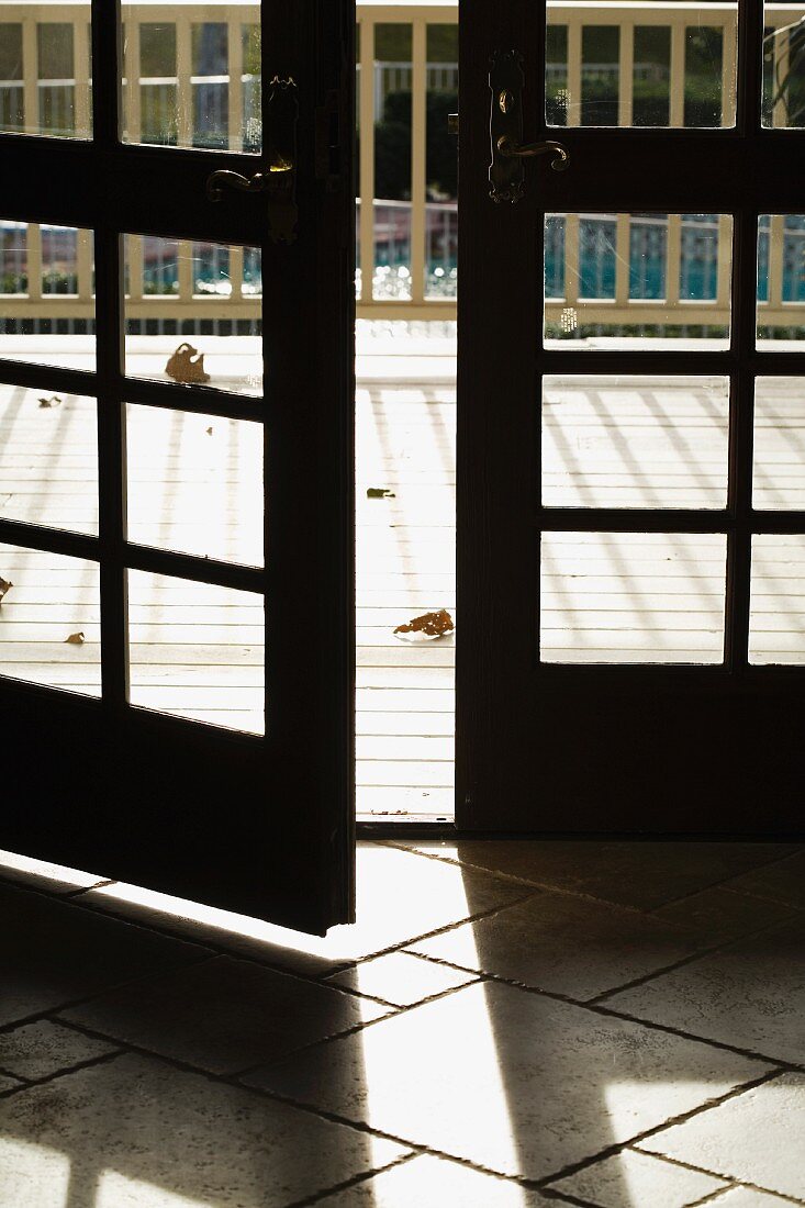 Open French doors leading to deck