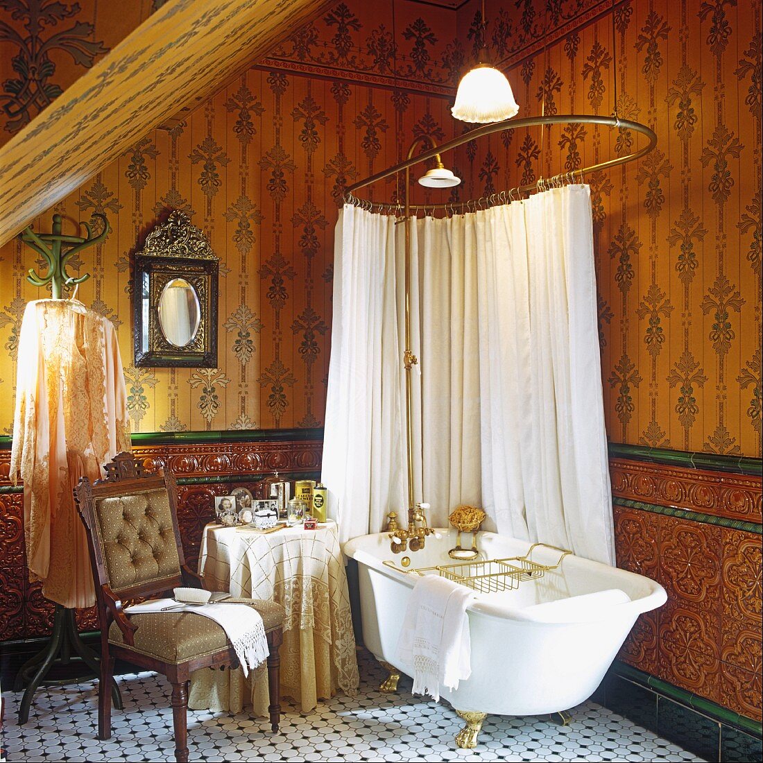 Free-standing bathtub with gilt feet and shower head and shower curtain hanging above in nostalgic bathroom