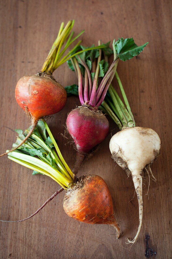 Four different coloured turnips