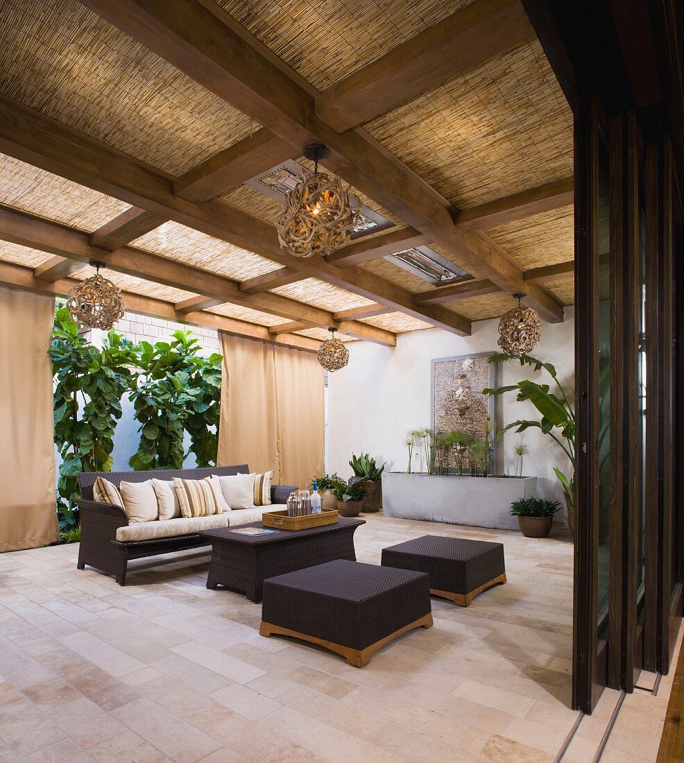 Contemporary outdoor patio with pocket doors