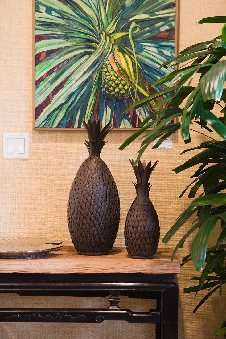 Pineapple decorations on end table