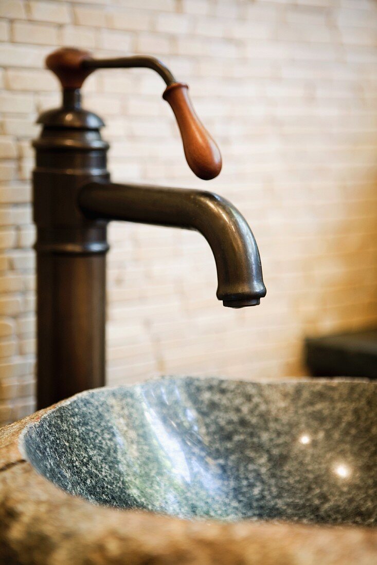 Close up of a stone bowl sink