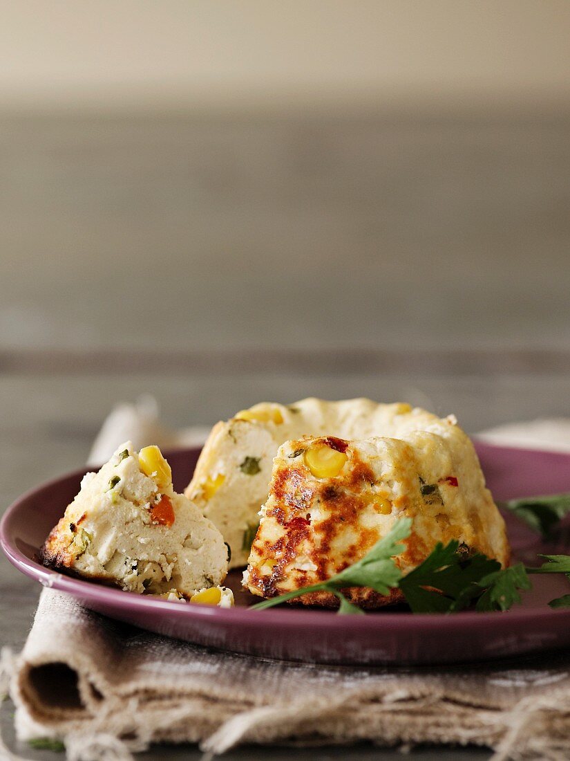 Ricotta cakes with sweetcorn, chillis and peper