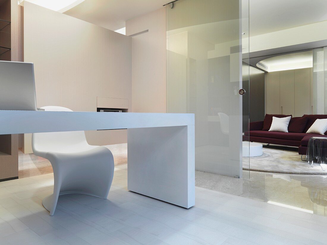 Simple white desk with modern chair